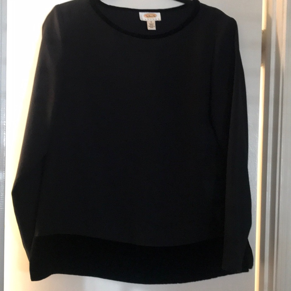 Evening wear top. Black polyester/rayon with velvet trim.